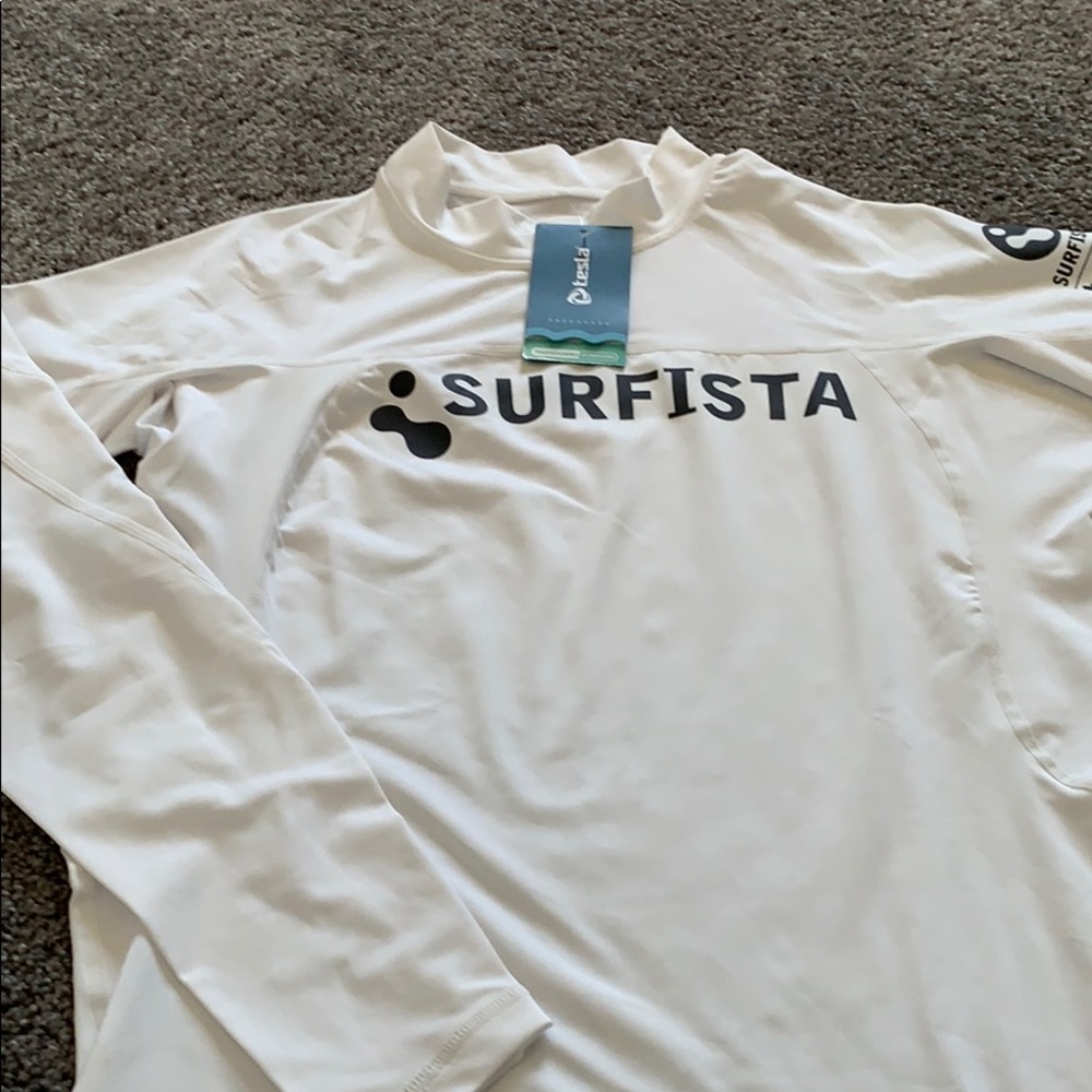 Rushguard by Tesla . New size XL , EU 40.